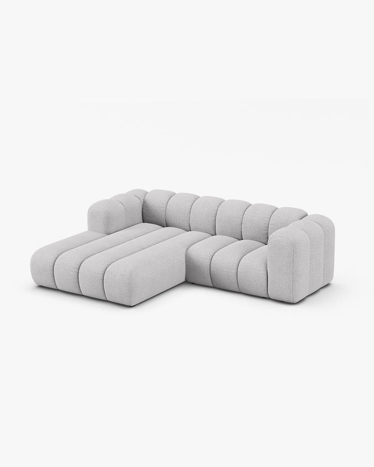 PolsterOase Modulsofa – Grandé Ecksofa 3-Sitzer in Bouclé, 230 cm Breite, Grau, Links – Seitenansicht