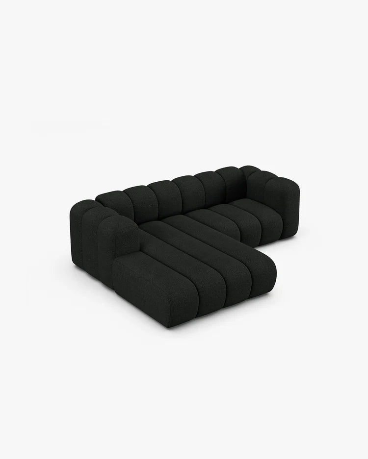 PolsterOase Modulsofa – Grandé Ecksofa 3-Sitzer in Bouclé, 230 cm Breite, Schwarz, Links – Perspektivische Ansicht