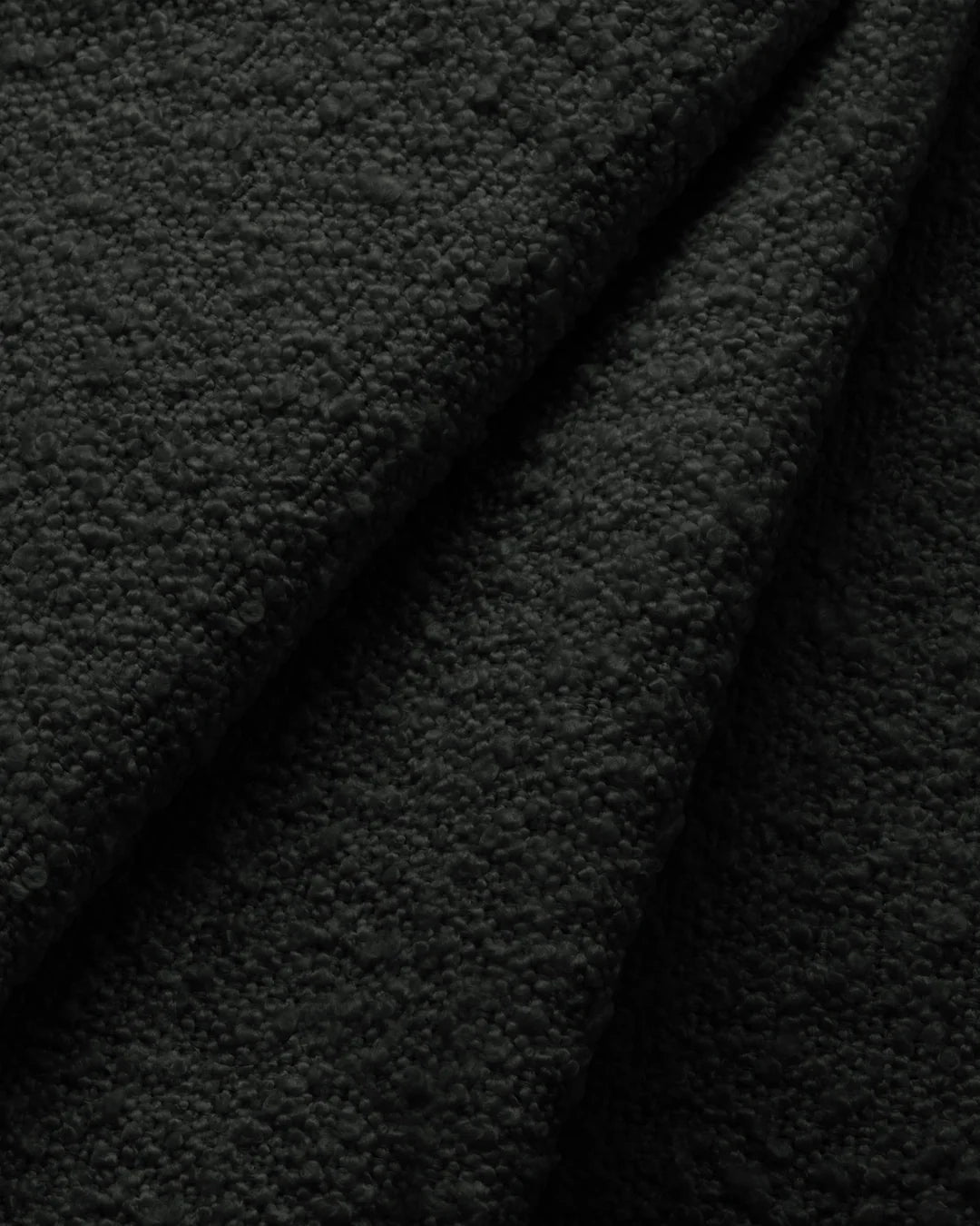 PolsterOase Modulsofa – Grandé Ecksofa 3-Sitzer in Bouclé, 230 cm Breite, Schwarz, Links – Rückansicht