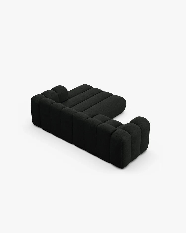 PolsterOase Modulsofa – Grandé Ecksofa 3-Sitzer in Bouclé, 230 cm Breite, Schwarz, Rechts – Detailansicht