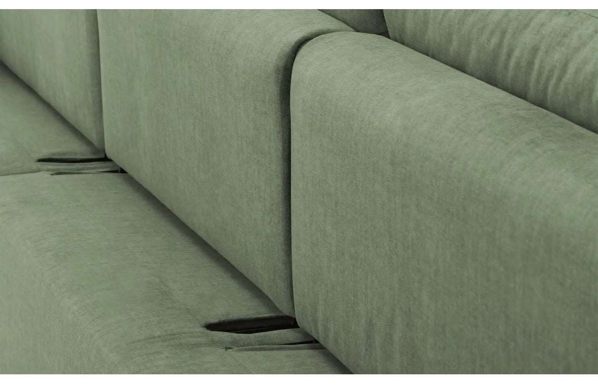 Ecksofa in Samt Grün